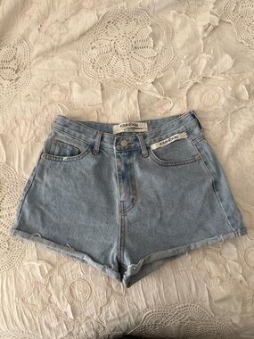 Kimhēkin ‘my uniform’ light wash denim shorts size medium